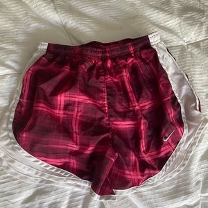 Nike shorts size small (pink & red pattern)